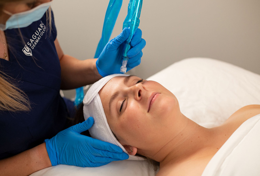 Saguaro Dermatology Aesthetic Membership Program Patient at Saguaro Dermatology getting a Exfoliate Dermaplane facial