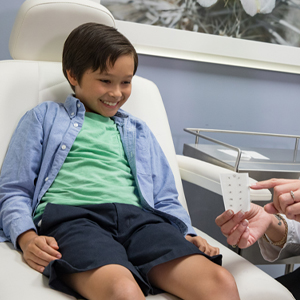 Profile view of a male teenager's face with acne